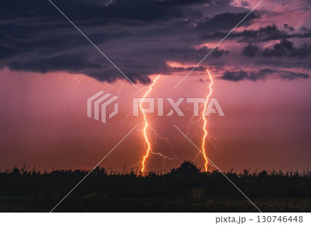 Lightning storm in the sky, lightning bolts in the storm clouds 130746448