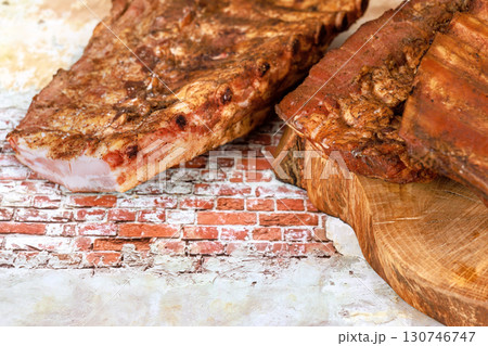 Delicious pork ribs display beautiful seasoning, ready to be served at barbecue gathering. 130746747