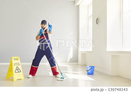 Janitor dancing fun, janitorial team worker dancer, cleaning service industry, professional washing Janitor dancing fun, janitorial team worker dancer, cleaning service industry, professional washing 130748143