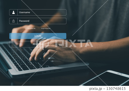 Businessman hand typing on keyboard with login and password on screen display online treat. login password. cyber security. Data protection and secure internet access. cybersecurity, Phishing. 130748615