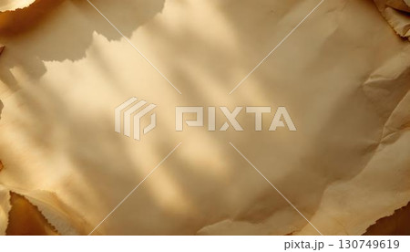 Vintage paper texture background featuring subtle shadows and a warm, aged appearance 130749619