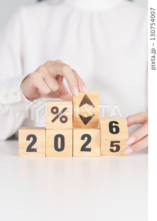 2025 to 2026 New year with percentage change to UP and Down arrow. Interest rate, GDP, stocks market, financial, deflation and Inflation, mortgage, debt, Loan and Economic Recession 130754007