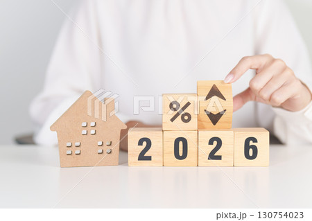 2026 New Year with percentage change to UP and Down arrow with Home model. Real estate Mortgage, Refinance, House loan and debt, Interest rate, Insurance, Financial and Property Tax 130754023
