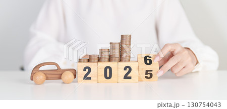 2025 end year to Happy New Year 2026 with car model and Coins Money stack for deposit and Automobile Tax. Money Saving, Car Insurance, Financial, vehicle Repair and Maintenance and New Year concept 2025 end year to Happy New Year 2026 with car model and Coins Money stack for deposit and Automobile Tax. Money Saving, Car Insurance, Financial, vehicle Repair and Maintenance and New Year concept 130754043