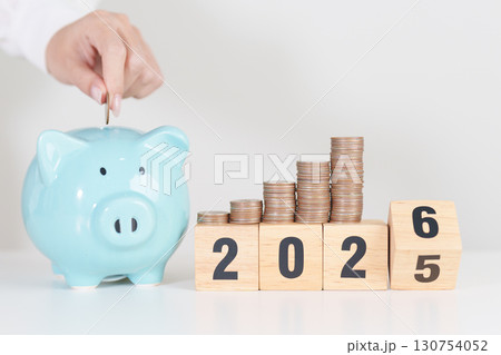 2025 end year to Happy New Year 2026 with piggy bank. Resolution, Goals, Plan, Action, Money Saving, Retirement fund, Pension, Investment and Financial concepts 2025 end year to Happy New Year 2026 with piggy bank. Resolution, Goals, Plan, Action, Money Saving, Retirement fund, Pension, Investment and Financial concepts 130754052