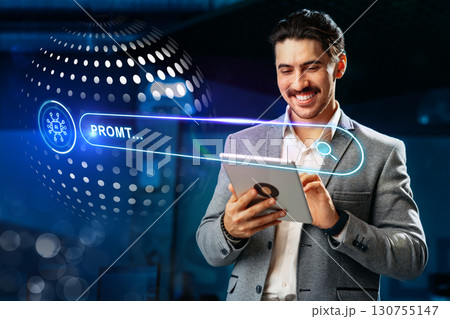 Professional man engaged in digital interaction while smiling in a modern office environment during daytime Professional man engaged in digital interaction while smiling in a modern office environment during daytime 130755147