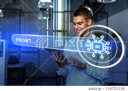 Young professional engages with AI technology in modern office setting while exploring digital innovations during work hours Young professional engages with AI technology in modern office setting while exploring digital innovations during work hours 130755188