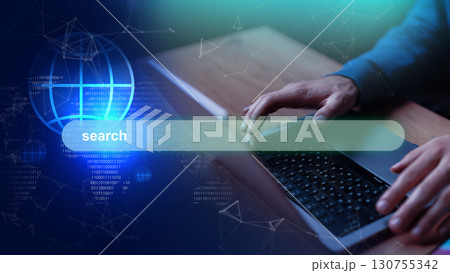 User typing on a laptop with a digital interface displaying a search bar and data visualization User typing on a laptop with a digital interface displaying a search bar and data visualization 130755342