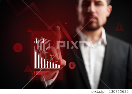 Business professional analyzing data trends using digital interface on black background 130755623