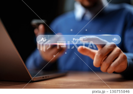 Exploring AI prompt creation at home using a laptop in a cozy evening setting Exploring AI prompt creation at home using a laptop in a cozy evening setting 130755846