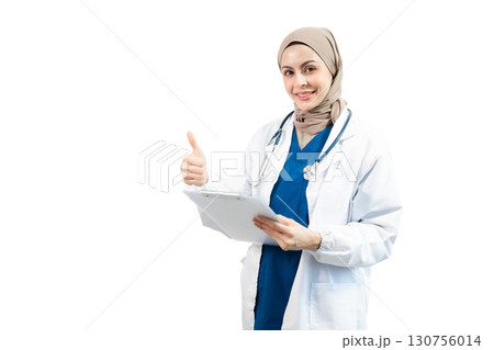 Muslim Arab person. The face of a female doctor on an isolated white background. Muslim Arab person. The face of a female doctor on an isolated white background. 130756014