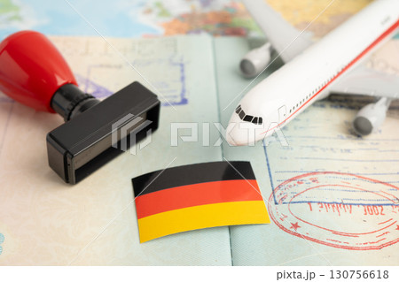 Germany flag and passport with airplane for travel. 130756618