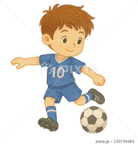 A cheerful boy playing soccer, showcasing joy and activity in sports. 130756863