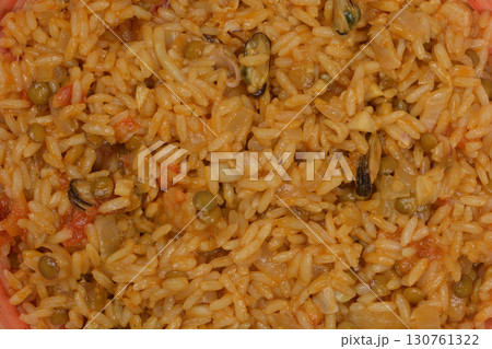 Rice dish with lentils, tomatoes, and seafood Rice dish with lentils, tomatoes, and seafood 130761322