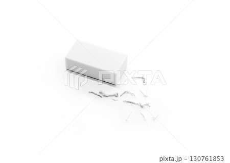 White eraser with torn shavings on a clean white background White eraser with torn shavings on a clean white background 130761853