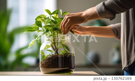 Nurturing Green Plant in Glass Jar. Generative ai 130762169