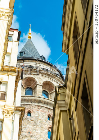 Istanbul, Turkey. View of Galata tower through the streets with tight buildings. Travel attraction. Islamic architecture 130764172