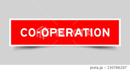Red color square shape sticker label with word co operation on gray background 130766287