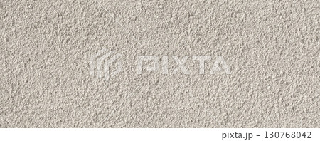 White rough plaster wall texture providing seamless background 130768042