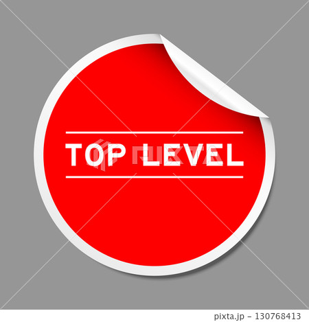 Red color peel sticker label with word top level on gray background 130768413