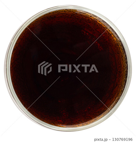 Top View of Dark Soda in Wine Glass on White Background Top View of Dark Soda in Wine Glass on White Background 130769196