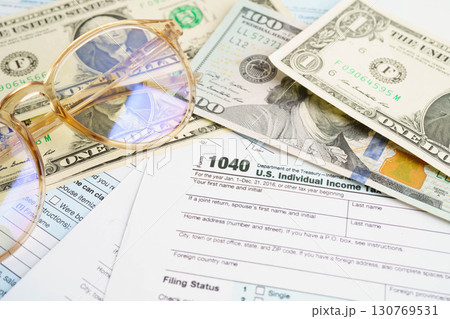 Tax form 1040 U.S. Individual Income Tax Return, business finance concept. 130769531