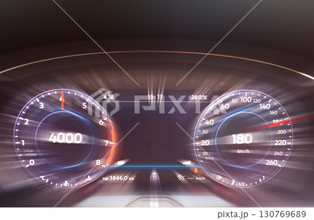Speedometer and tachometer of modern car. Fast speed on the speedometer Speedometer and tachometer of modern car. Fast speed on the speedometer 130769689
