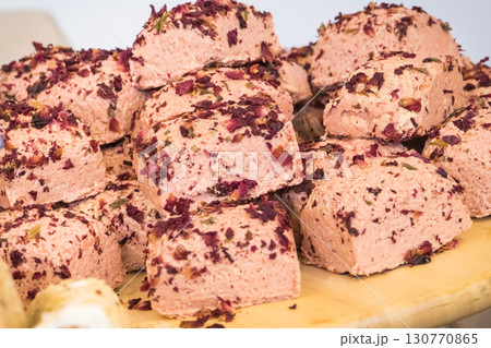 Halva with pomegranate juice and rose petals. Traditional balkan dessert 130770865