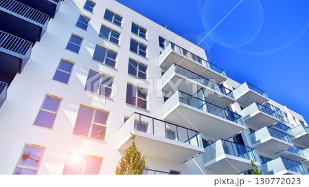 Architectural details of modern apartment building. Modern european residential apartment building complex. Architectural details of modern apartment building. Modern european residential apartment building complex. 130772023
