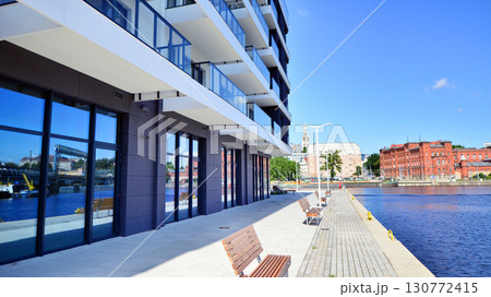 Panoramic windows of new commercial premises. Commercial property in development standard for rent. Panoramic windows of new commercial premises. Commercial property in development standard for rent. 130772415