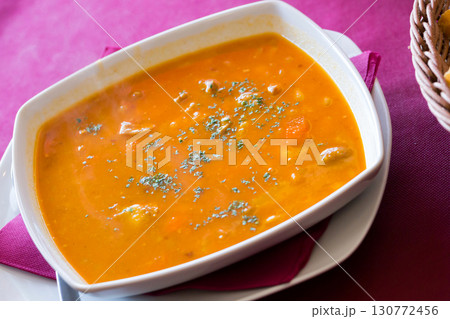 Stew of beans with pig ears 130772456