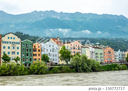 Innsbruck in cloudy day with sun, Austria town with colorful hou 130772717