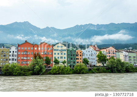 Innsbruck in cloudy day with sun, Austria town with colorful hou 130772718