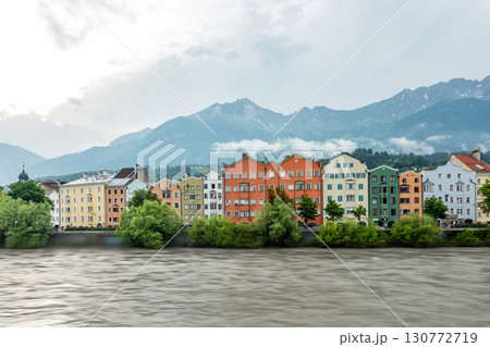 Innsbruck in cloudy day with sun, Austria town with colorful hou 130772719