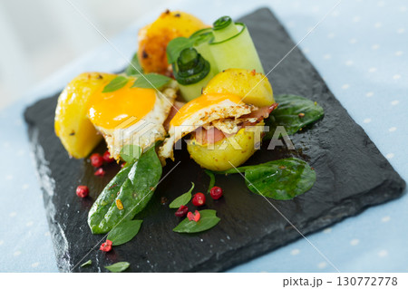 Potato burgers with quail egg 130772778
