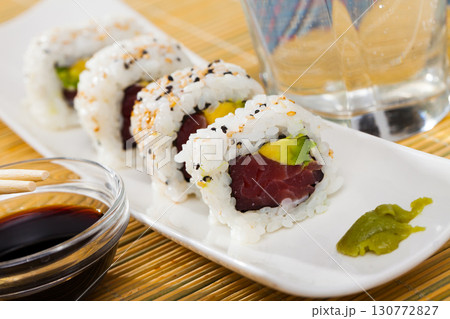 Tuna and avocado sushi uramaki 130772827