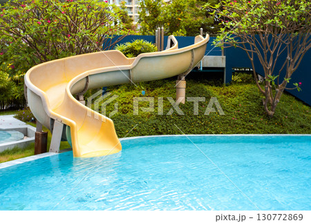 Pool Slide Swimming public pool slide blue water outdoors 130772869