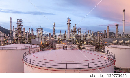 Aerial view oil and gas refinery plant at night, Global business energy logistic transportation, Oil and gas refinery petrochemical industrial, Petrochemical refinery industrial energy supply chain. 130773933