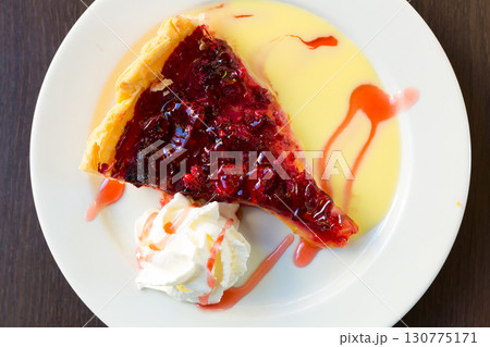 Top view of raspberry quiche with whipped cream Top view of raspberry quiche with whipped cream 130775171