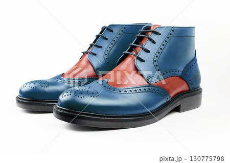 Crafted leather boots in blue and brown tones 130775798