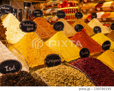 Vibrant mounds of spices, arranged in neat piles with handwritten labels, Istanbul, Turkey Vibrant mounds of spices, arranged in neat piles with handwritten labels, Istanbul, Turkey 130780195
