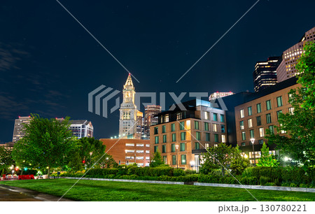 Night view of the Boston skyline and the illuminated Custom House Tower from the lawns of the Carolyn Lynch Gardens on the Rose Kennedy Greenway. Massachusetts, United States Night view of the Boston skyline and the illuminated Custom House Tower from the lawns of the Carolyn Lynch Gardens on the Rose Kennedy Greenway. Massachusetts, United States 130780221