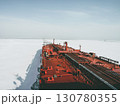 View from the captain's bridge to the deck of a large crude oil tanker sailing among the ice 130780355
