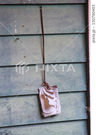 Old notebook hanging on weathered wall at Hsiang Kuang Village Taiwan. Old notebook hanging on weathered wall at Hsiang Kuang Village Taiwan. 130780403