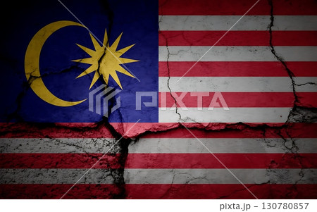 Malaysian flag and american flag with a crack running through the center of image Malaysian flag and american flag with a crack running through the center of image 130780857