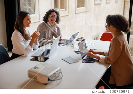 Join us for a productive Collaborative Business Meeting with laptops and a projector Join us for a productive Collaborative Business Meeting with laptops and a projector 130780971