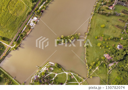 Aerial drone view over tranquil Boating lake in Nagykanizsa, Hungary. 130782074