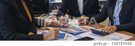 Banner Group of business people meeting in conference room. Panorama Asian businesspeople brainstorm teamwork partnership. Happy teams meeting graph chart business data meeting room with copy space 130785939