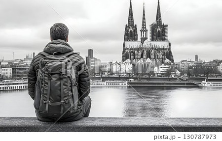 Solitary Traveler Contemplating Cologne Cathedral 130787973