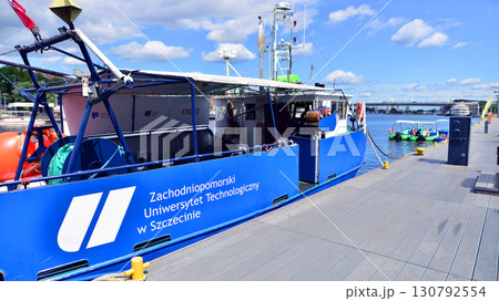 Szczecin, Poland. 16 July 2025. Landscape view and ships and boats on the Odra River Szczecin, Poland. 16 July 2025. Landscape view and ships and boats on the Odra River 130792554
